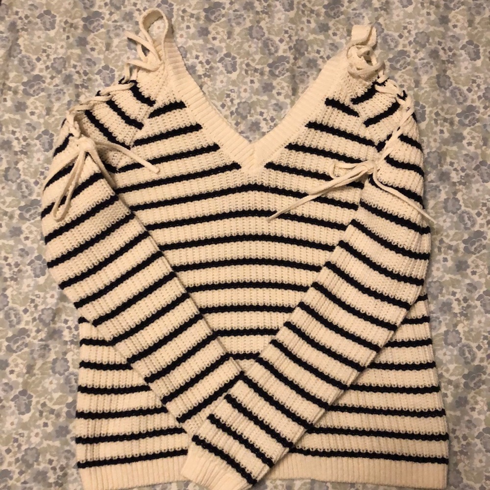 Sweater with black stripes